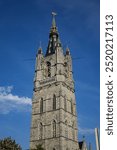 Gothic style Grand Belfry of Ghent (late 14th century, 91m tower) - symbol of the city Ghent. Ghent is a city and a municipality located in the Flemish region of Belgium.