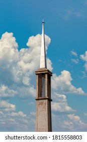 gothic tower with the cardinal points in top