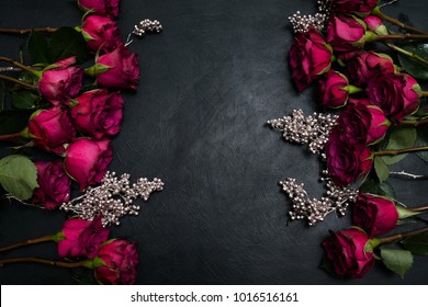 Gothic Wedding Flowers Decor. Dark Red Or Burgundy Roses With Silver Adornment On Black Background. Bold, Daring ,alternative ,and Luxury Reception Party Flower Arrangement