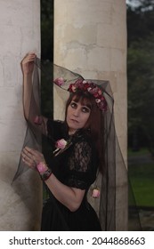 Gothic Woman In Mysterious Place, Long Black Victorian Dress Create Dramatic Atmosphere. Classic Horror Scene.