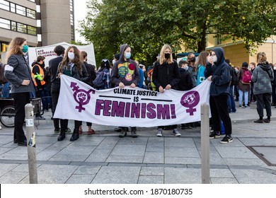 Gottingen, Germany. Autumn 2020. Fridays For Future. Group Of Young Women Holding Up Feminism And Climate Justice Banner At Demonstration. 