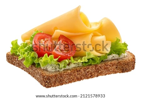 Gouda cheese slices on rye bread isolated on white background, top view