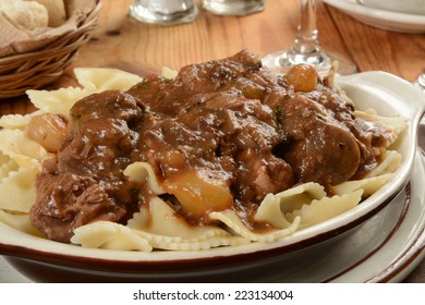 Gourmet Boeuf Bourguignon On A Bed Of Farfalle Pasta.  Also Known As Beef Burgundy