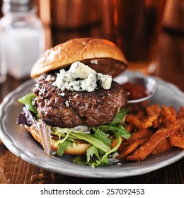 Gourmet Burger With Blue Cheese And Sweet Potato Fries On Metal Plate. 