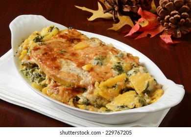 Gourmet Butternut Squash And Spinach Gratin In A Small Casserole Dish