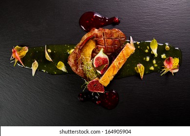 Gourmet duck dish with onion jam and figs