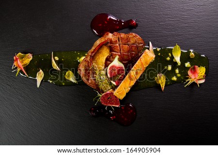 Gourmet duck dish with onion jam and figs