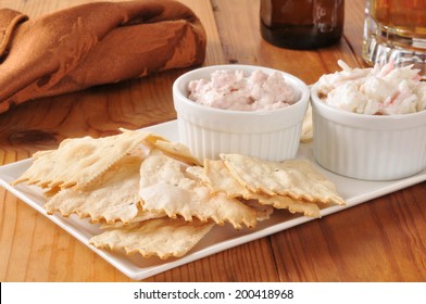 Gourmet flatbread crackers with crab and ham spreads