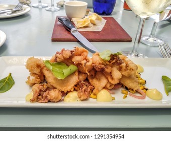 Gourmet Fried Calamari From West Coast, South Africa With Lemon Garlic Mayonaise And Grilled Sweetcorn