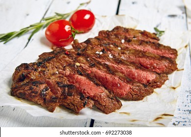 Gourmet Grill Restaurant Beef Steak Menu - Flank Steak On Wooden Background. Beef Steak Dinner