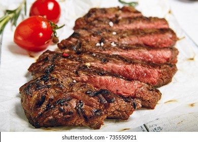 Gourmet Grill Restaurant Beef Steak Menu - Flank Steak On Wooden Background. Beef Steak Dinner