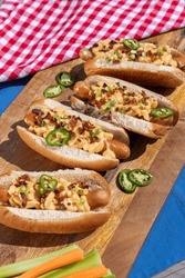 Gourmet Grilled All Beef Hots Dogs With Carrot And Celery Sticks Topped With Bacon Mac And Cheese Jalapenos And Green Onions