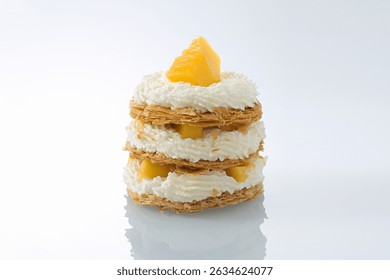 Gourmet Mango Mille-Feuille Stack with Piped Cream and Fresh Fruit