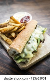 gourmet Philly Cheese steak american Sandwich with fries
