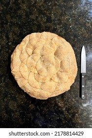 Gourmet Pie With Flaky Crust And Knife