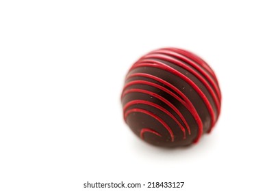 Gourmet Raspberry Rendezvous Truffle On A White Background.