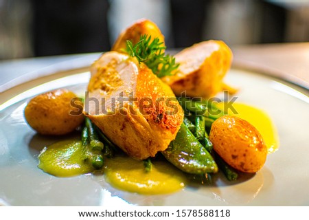 gourmet restaurant dish with dessert, meat, fish or entree