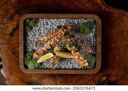 Similar – Image, Stock Photo Skewering moss on a wall stone in front of a blurred background