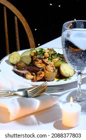 Gourmet Surf And Turf Cajun Shrimp And Steak Dinner Entree With New Potatoes At A Fancy Expensive Wedding