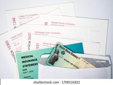 Goverment Check In Envelope To Illustrate Coronavirus Stimulus Payment Being Used To Pay Many Past Due Bills And Invoices