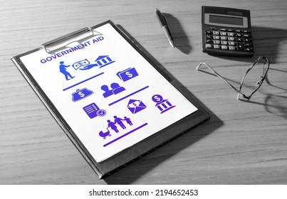 Government Aid Concept On A Clipboard With A Calculator