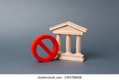 Government building or bank and symbol NO on an gray background. The concept of prohibiting and restrictive laws. Bans and criminalization, repression. Revocation of a bank license nationalization