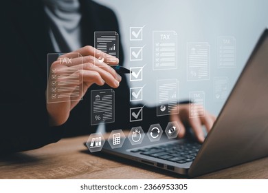 Government Business Individual income tax document online, Businesswomen check block of tax document return form for payment and financial research data analysis and document management - Shutterstock ID 2366953305