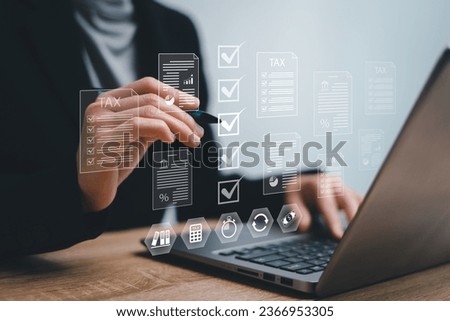 Government Business Individual income tax document online, Businesswomen check block of tax document return form for payment and financial research data analysis and document management