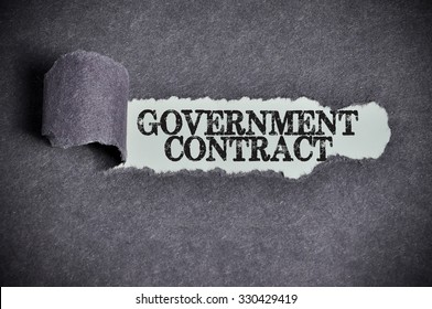 Government Contract Word Under Torn Black Sugar Paper.