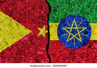 Government Of Ethiopia And Tigray Painted Flags On A Wall With Grunge Texture. Ethiopia And Tigray Conflict. Tigray War. Ethiopia Vs Tigray