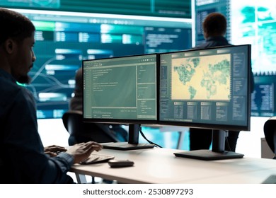Governmental hacking group targeting sensitive information through high tech cyber attacks, digital espionage. Team of IT experts working on national security and data privacy servers.