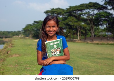 Gowainghat, Bangladesh - November 06, 2019: Girls' education is not so common in third-world countries. But the scenario is changing gradually. This girl is happy when she got admitted to the school.