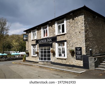 Gower, UK: April 29, 2021: The Gower Inn is a traditional village pub providing bar meals, afternoon teas and garden tables. It is owned by the Stonegate Group.