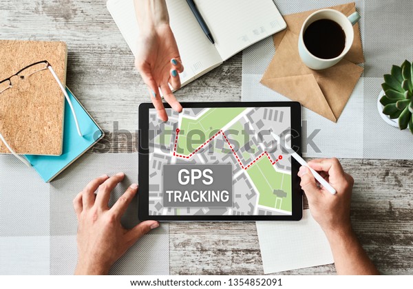 GPS Global positioning system tracking map on\
device screen.