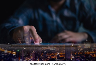 GPS Map, Pin Address Location On Mobile Apps. Double Exposure Of Man Hand Using Digital Tablet Searching Target Place On Night Cityscape While Working In Office.