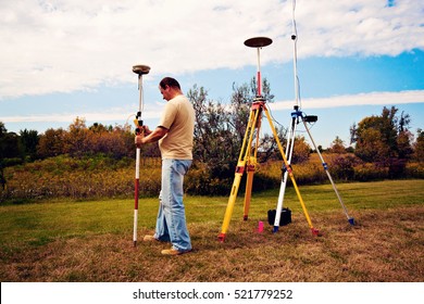 GPS survey - land surveyor in the field
