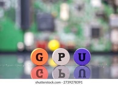 GPU (Graphic processing unit) initials on colorful wooden blocks with a blurred circuit board background
