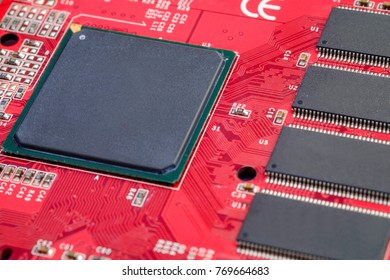 GPU and Memory ram with electronics components on red printed circuit board