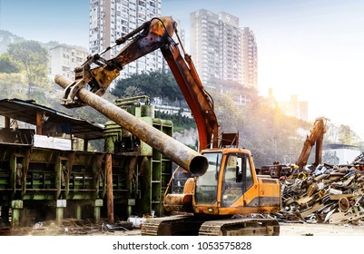 Grab crane works in waste recycling station - Powered by Shutterstock