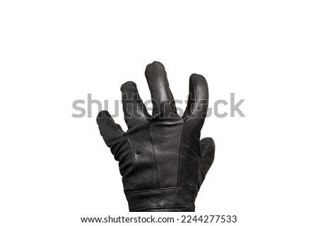 grabbing hand with leather glove isolated on white background, burglar creepy hand open fist stealing. Black leather glove isolated