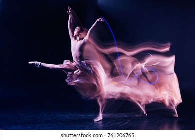 Grace and elegance. Beautiful gracious skillful woman standing on stage and doing some dance movements while showing her performance - Shutterstock ID 761206765
