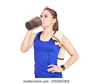 Graceful Athletic Woman With A Towel Drinks From A Shaker Bottle For Sports Drink After Workout, Isolated On White Background