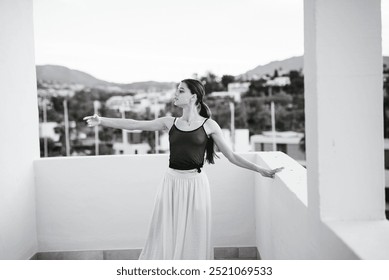 A Graceful Dancer Elegantly Posing on a Beautiful and Serene Balcony Overlooking Nature