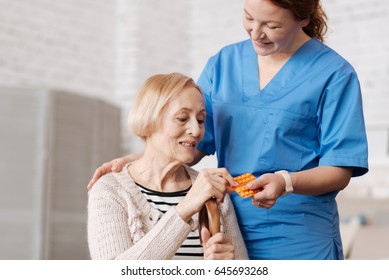 Graceful Excellent Doctor Giving The Medication