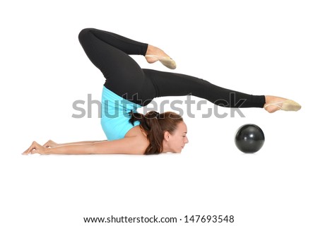 graceful girl in blue t-shirt doing exercise on a white background