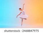 Graceful and poised young ballet dancer performs dance moves in action in neon light against blue-orange gradient background. Concept of art, movement, classical and modern fusion, beauty and fashion