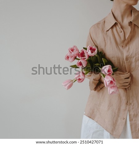 Similar – Image, Stock Photo Hold a bouquet of flowers in hand