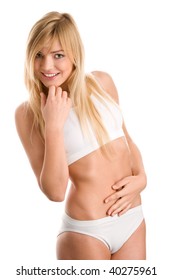 Graceful Young Woman Touching Flat Stomach Isolated On White Background