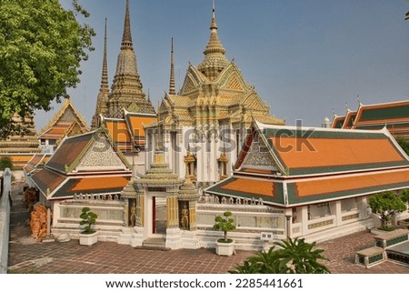 The gracefully detailed temple complex at Wat Pho temple in Bangok, Thailand.