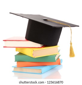 Grad Hat With Books Isolated On White